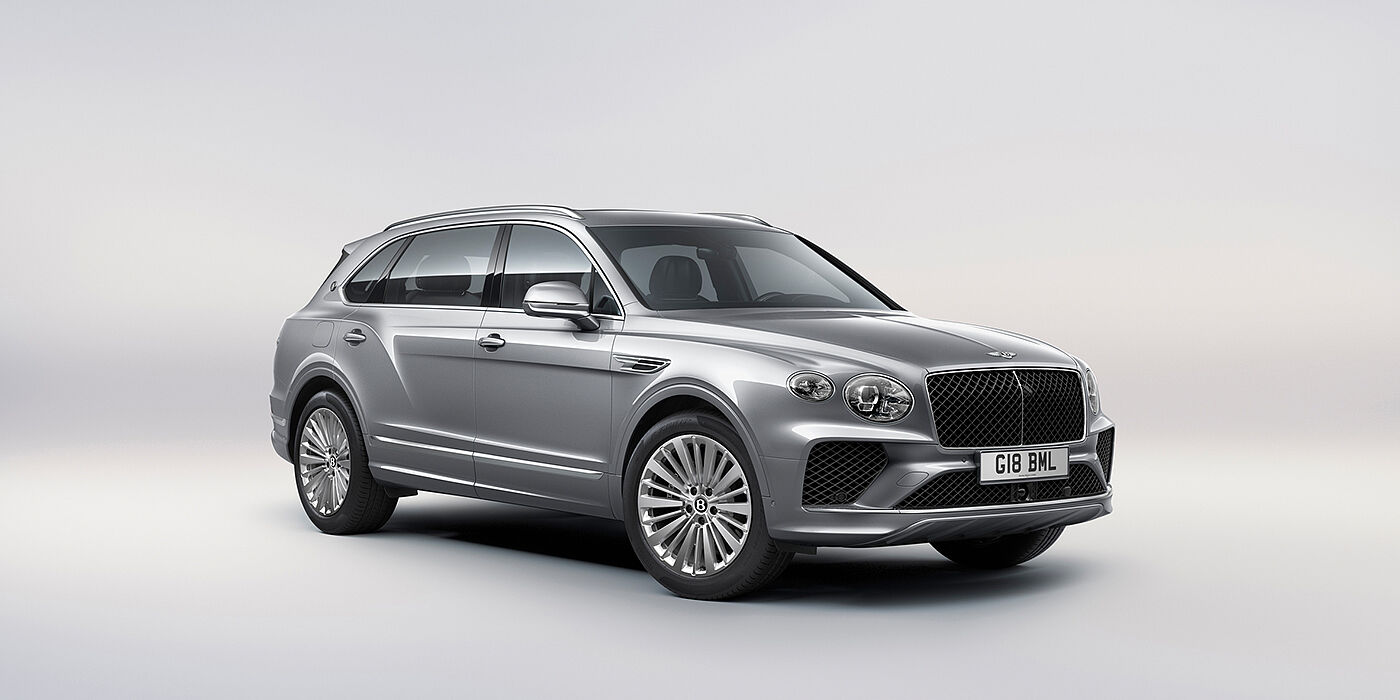 Bentley Athens Bentley Bentayga Extended Wheelbase luxury SUV front three quarter view in Moonbeam paint with 21 inch five spoke painted wheels