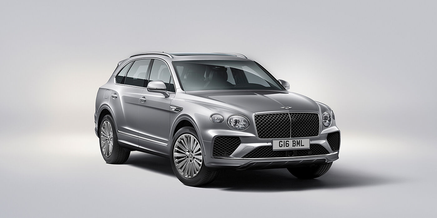 Bentley Athens Bentley Bentayga luxury SUV front three quarter view in Moonbeam paint with matrix grille and 21″ 5 spoke painted wheels