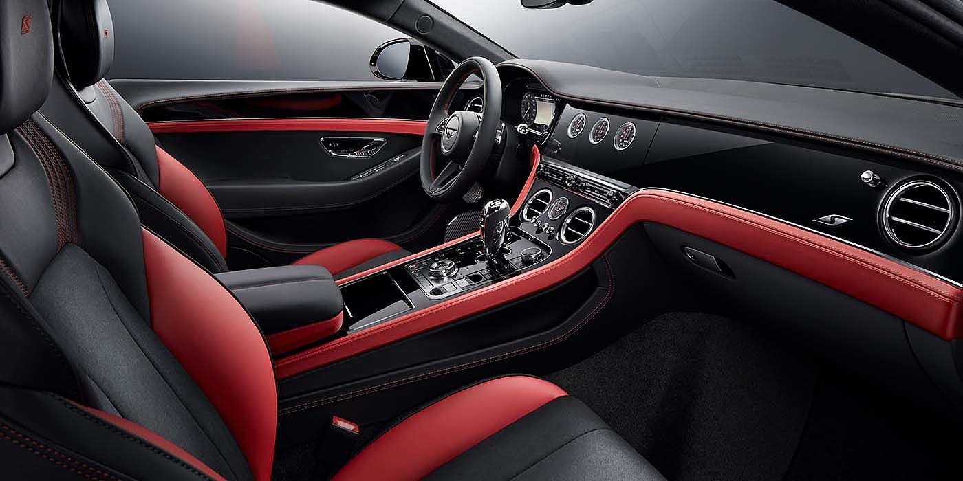 Bentley Athens Bentley Continental GT S coupe front interior in Beluga black and Hotspur red hide with high gloss Carbon Fibre veneer