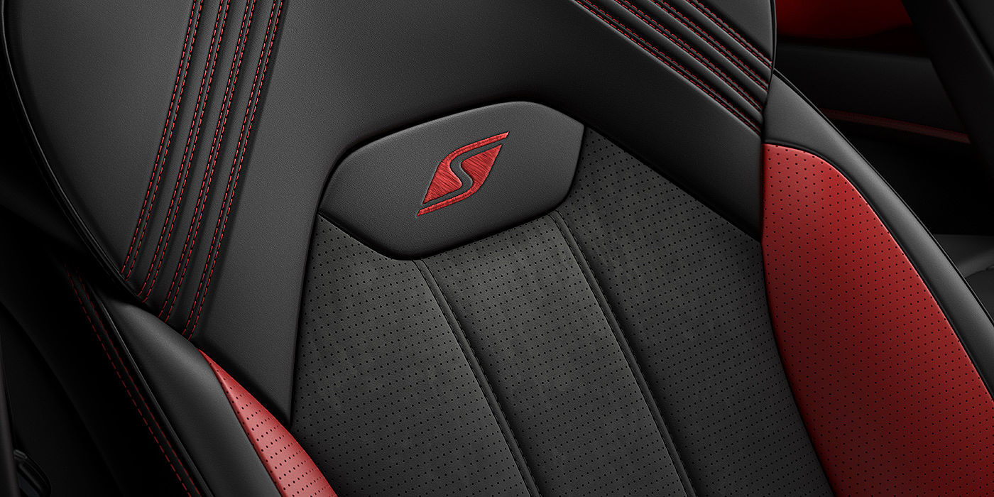 Bentley Athens Bentley Bentayga S seat with detailed red Hotspur stitching and black Beluga coloured hide. 