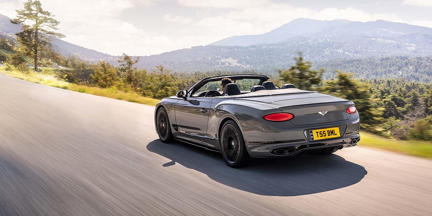 Bentley Athens Bentley Continental GTC S convertible in Cambrian Grey paint rear 34 dynamic driving