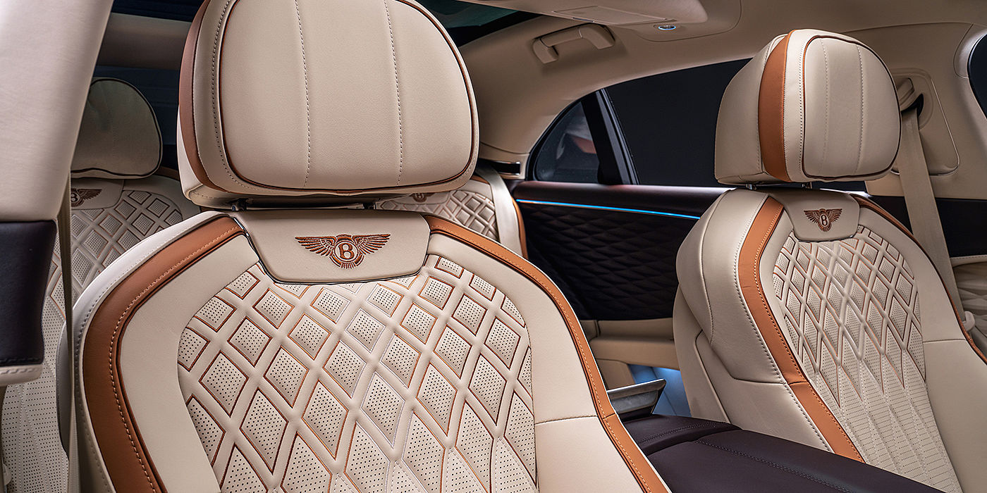 Bentley Athens Bentley Flying Spur Odyssean sedan rear seat detail with Diamond quilting and Linen and Burnt Oak hides