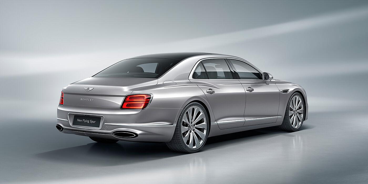 Bentley Athens New Bentley Flying Spur sedan rear view in Silverlake paint with ten spoke wheels and chrome matrix grille