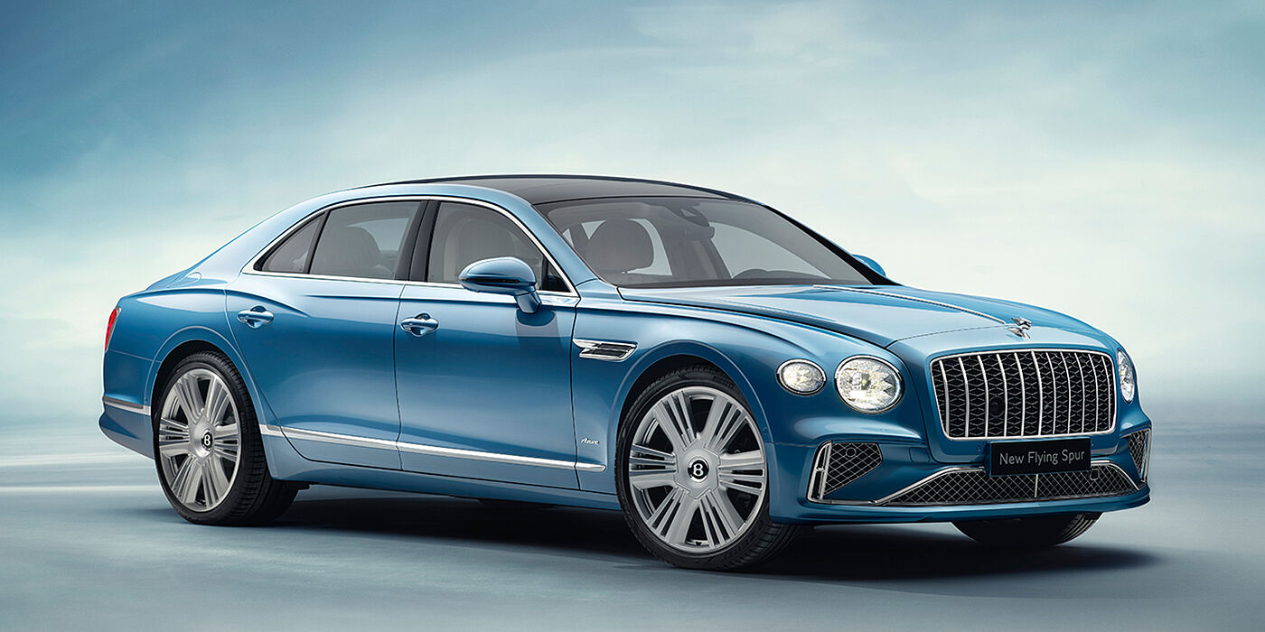 Bentley Athens New Bentley Flying Spur Azure sedan front view in Light windsor blue by Mulliner paint with 22 inch Azure wheels and chrome exterior details