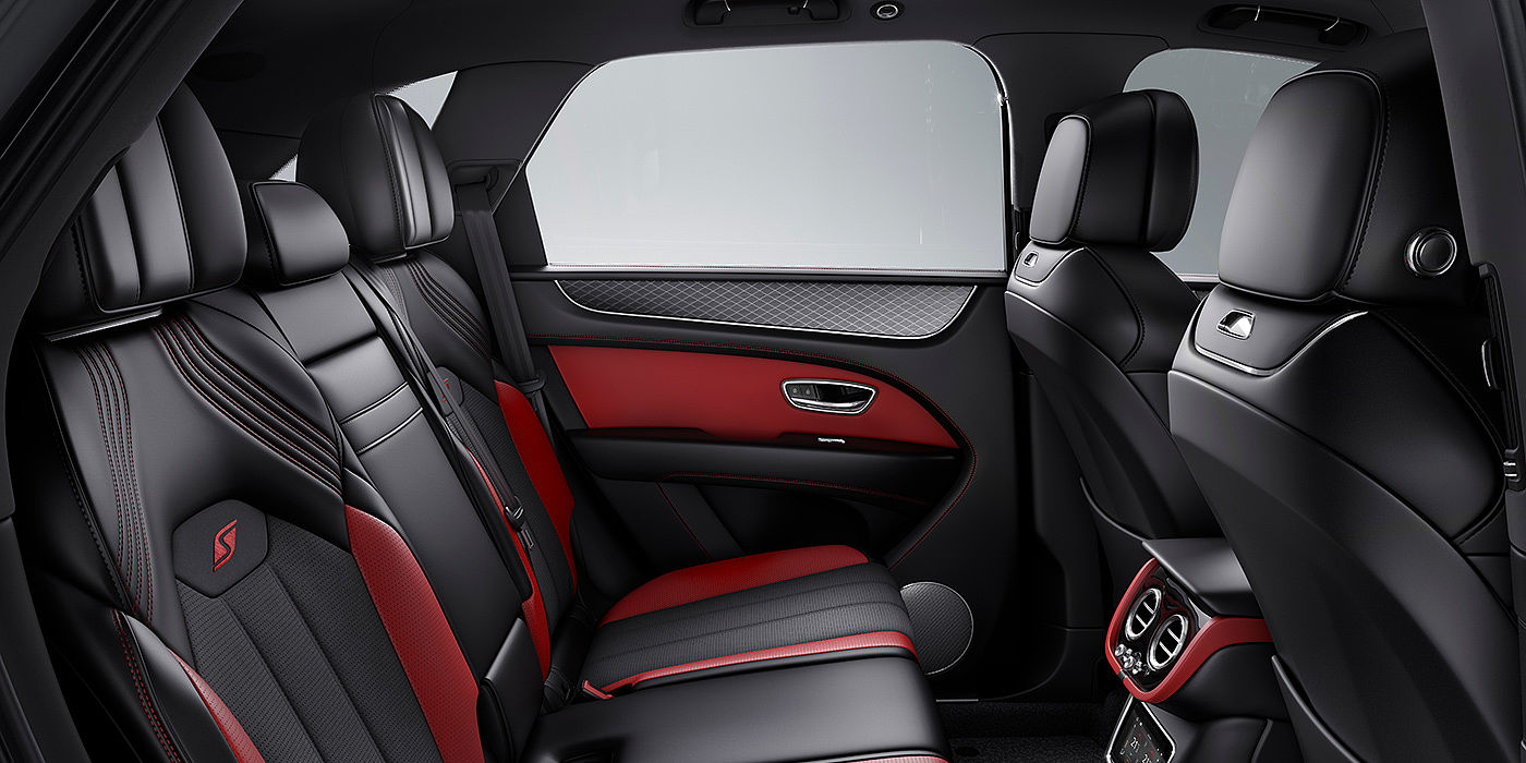 Bentley Athens Bentey Bentayga S interior view for rear passengers with Beluga black and Hotspur red coloured hide.