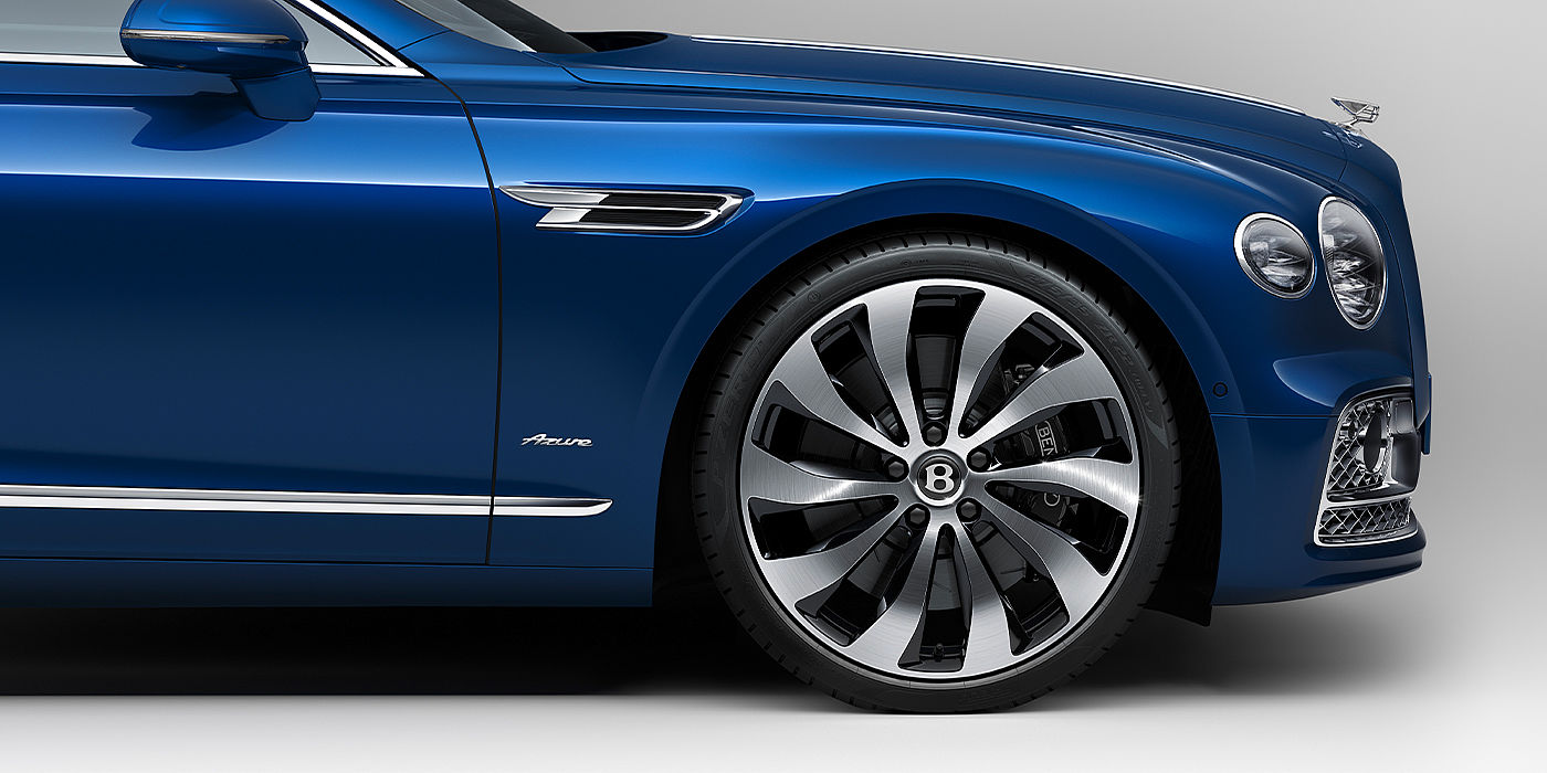 Bentley Athens Bentley Flying Spur Azure sedan side close up in Sequin Blue paint with Azure badge